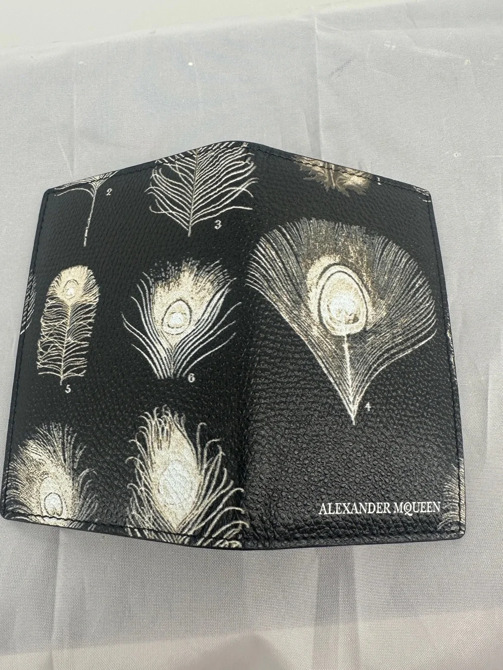 Alexander McQueen black feather bifold walket